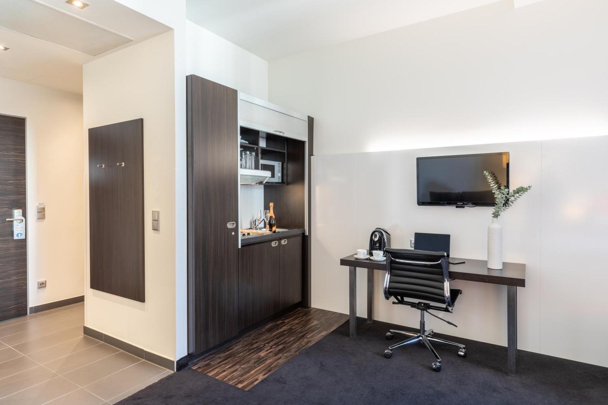 Habitación Premium con zona de cocina y cama grande